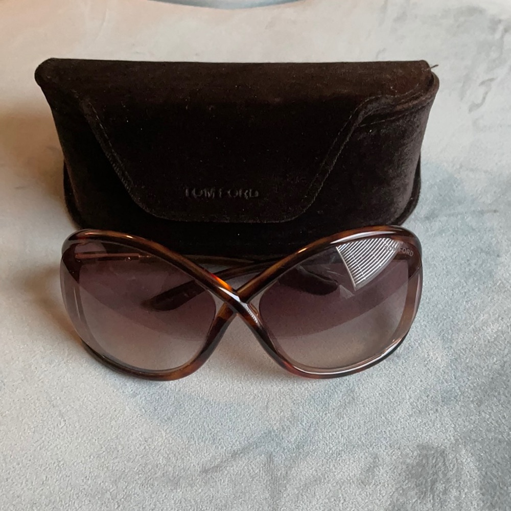 Brown sunglasses with gold accents